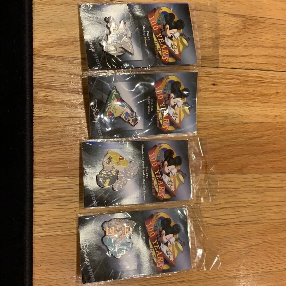 100 years of Disney PIN numbers 3, 16, 21, 19